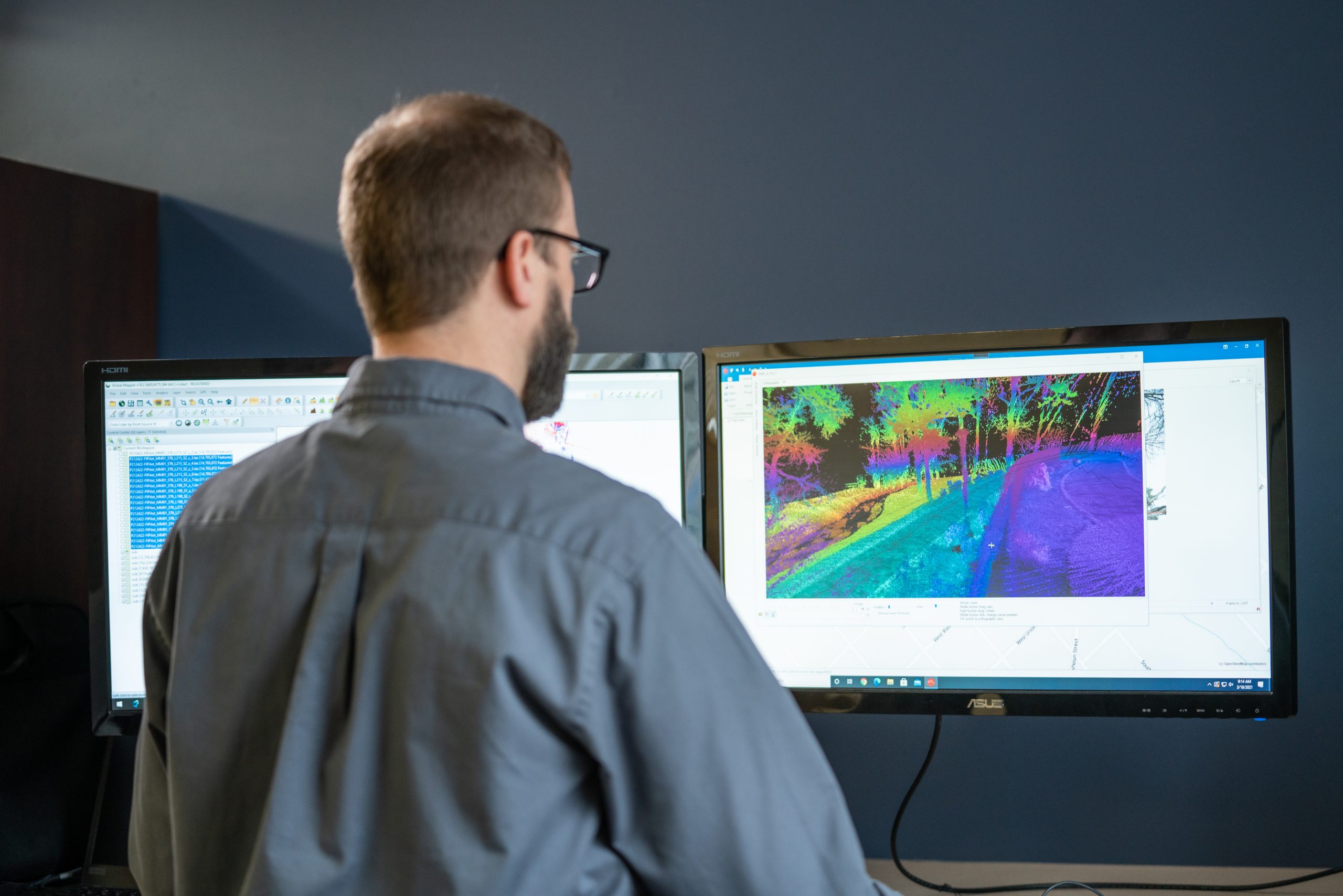 man reviewing data on a computer