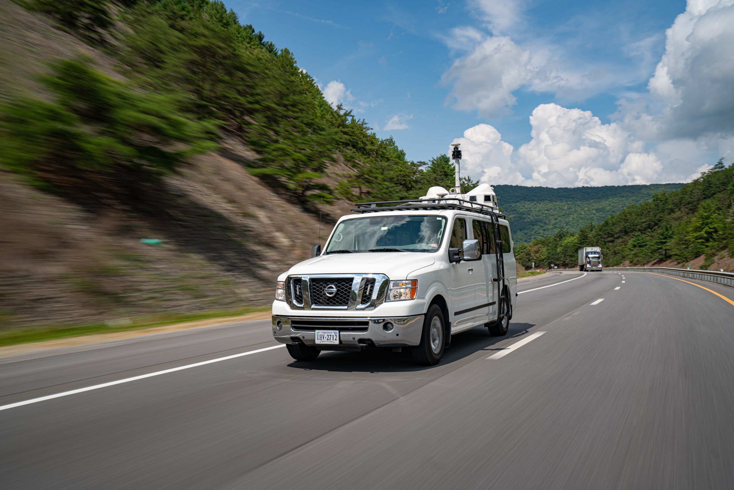 lidar van passing a mountain