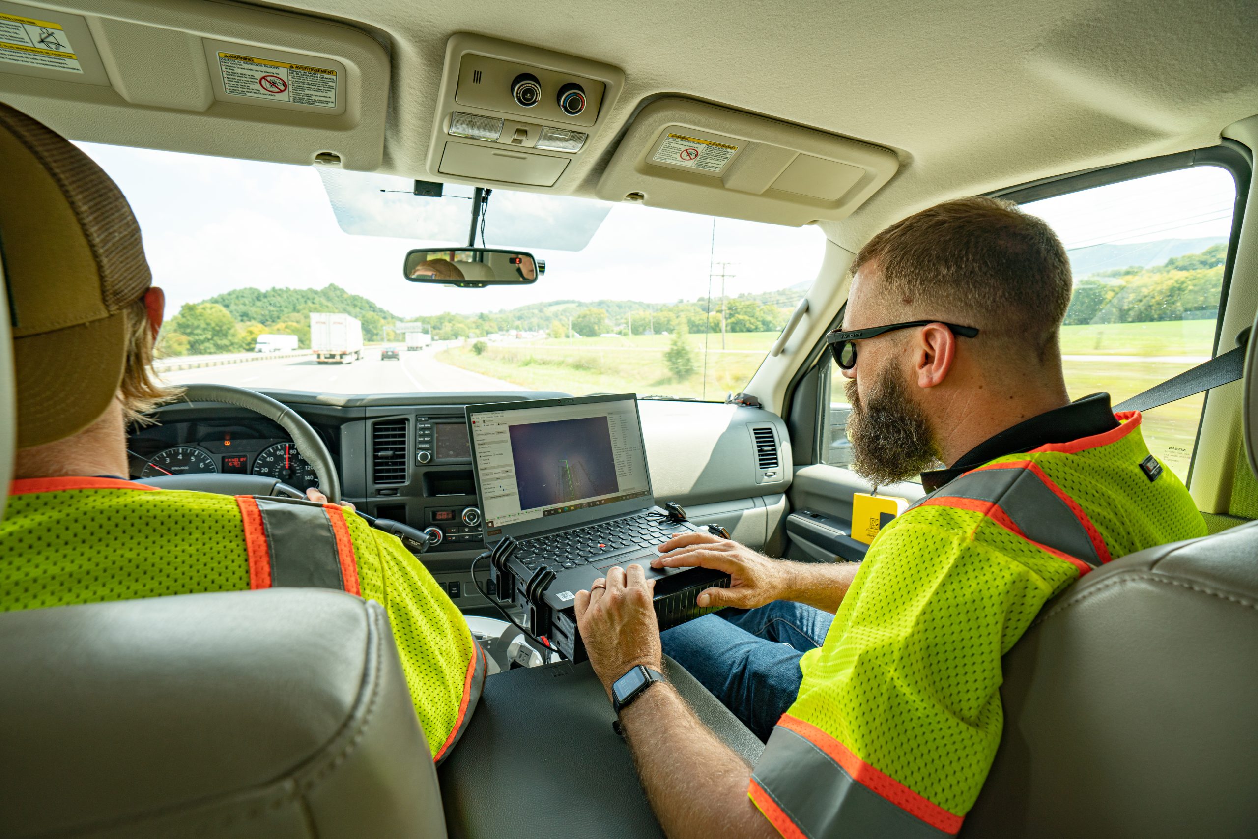 man on a laptop examining data